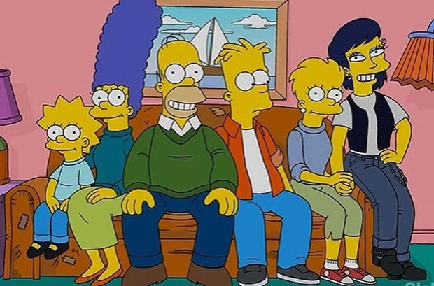 Lisa (� direita) posa para foto de fam�lia ao lado de namorada.