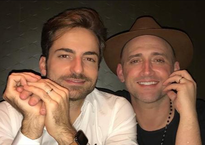 Paulo Gustavo e o marido Thales Breta